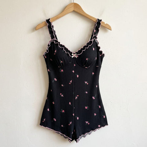the viola ribbed sleep romper black floral Black hanger
