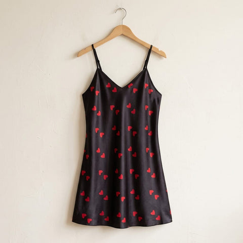 the luna satin slip dress heart print Black hanger